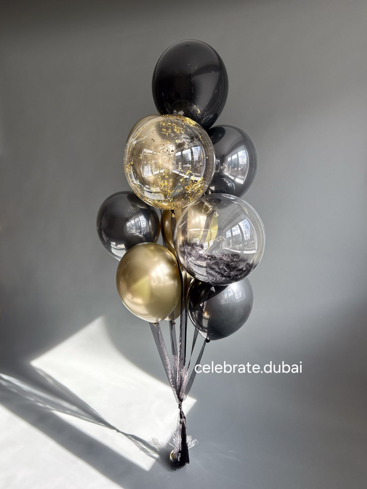 Balloon Arrangement In Black And Gold